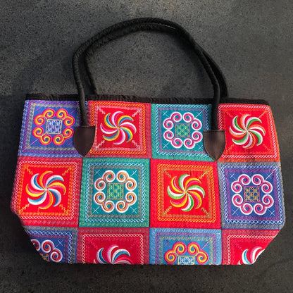 Schoudertas gekleurd borduursels ritssluiting